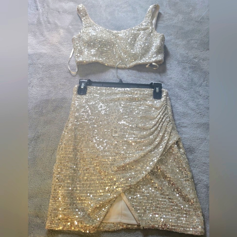 Two piece gold sequence top and skirt jump apparel by wendye chaitin